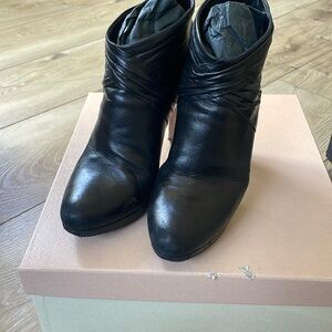 Prada Boots black 38.5 very soft leather and comfortable.